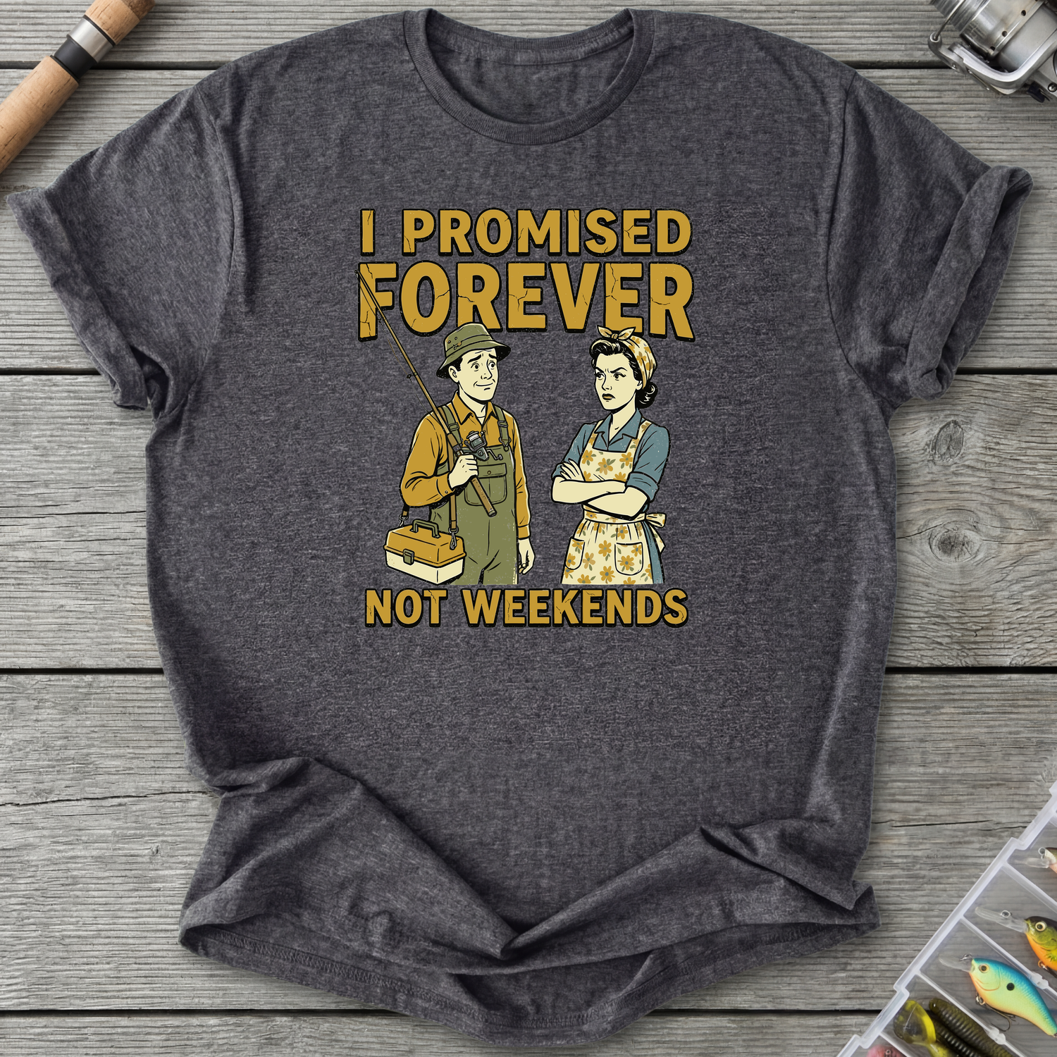 Gray t-shirt with graphic design of two people and text 'I Promised Forever Not Weekends' on a wooden surface.